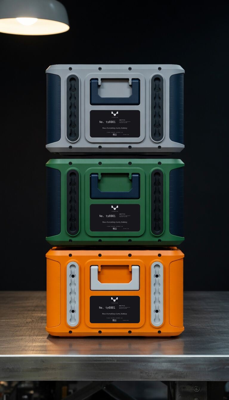 Tyo Worksystem trio stacked — orange, green, grey colorways with engraved spec plates